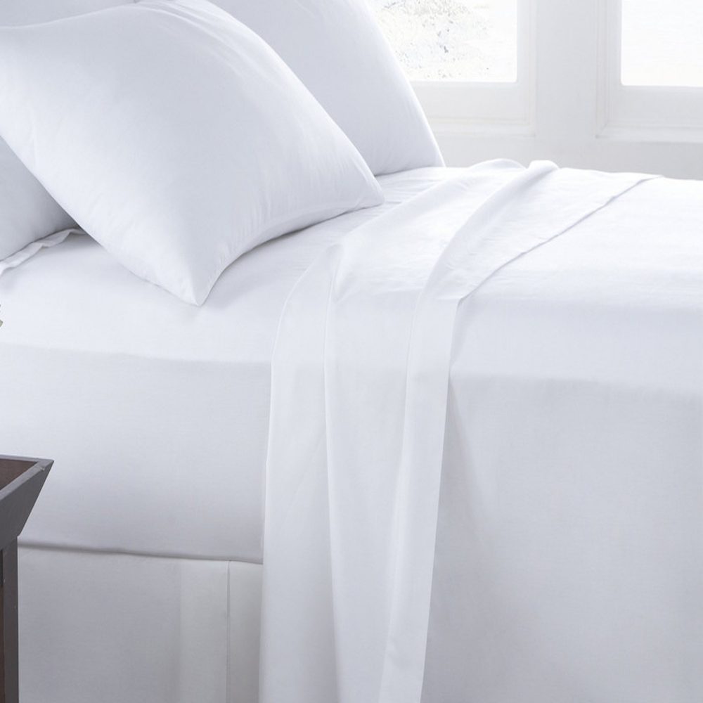 What Is a Fitted Sheet, and How Is It Different From a Top Sheet?